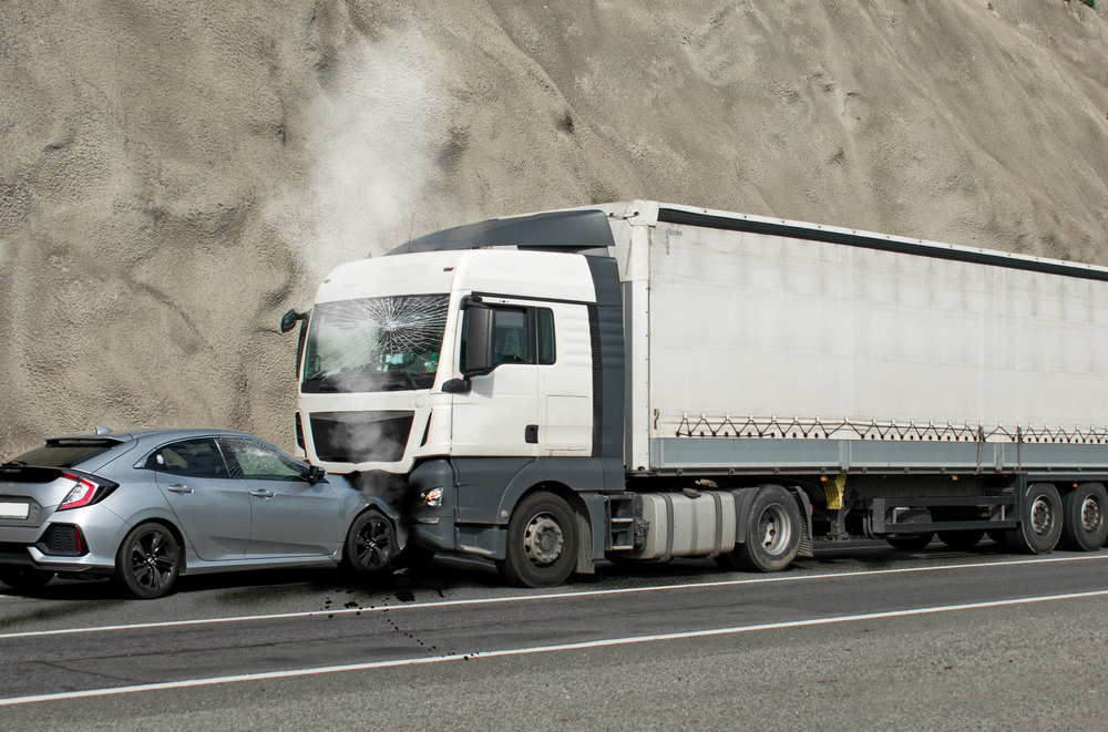 Photo of Frontal Impact Between a Truck and Car